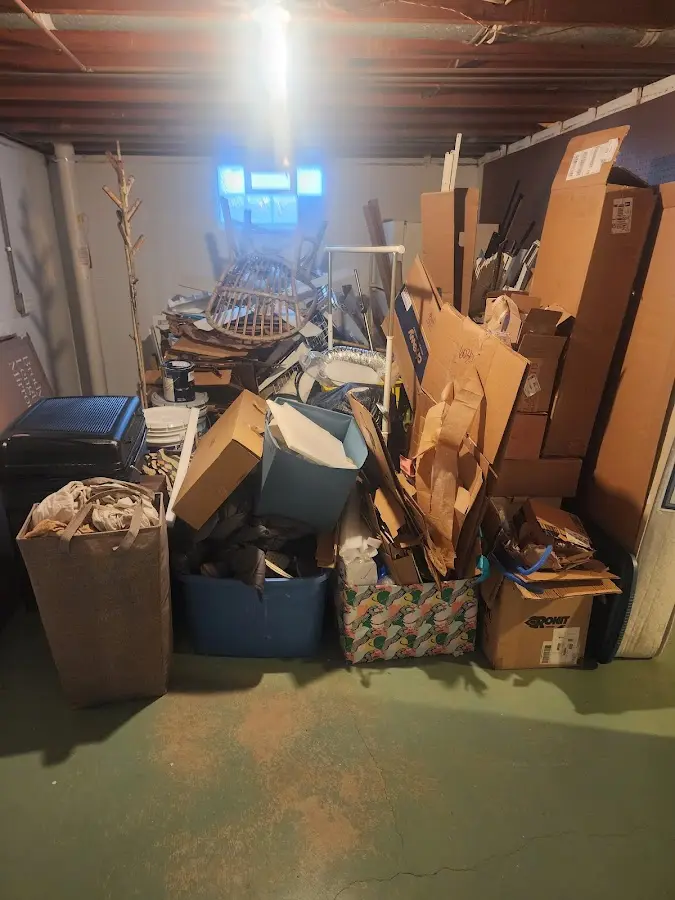 Roll-off dumpster container at job site for 15 Yard Dumpster Rental in Mendon